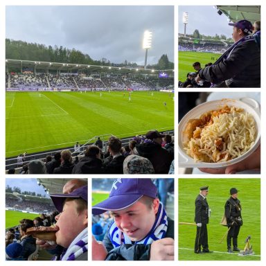 Fußballspiel mit Fans, einem Spieler, und einem Teller mit Essen im Stadion.